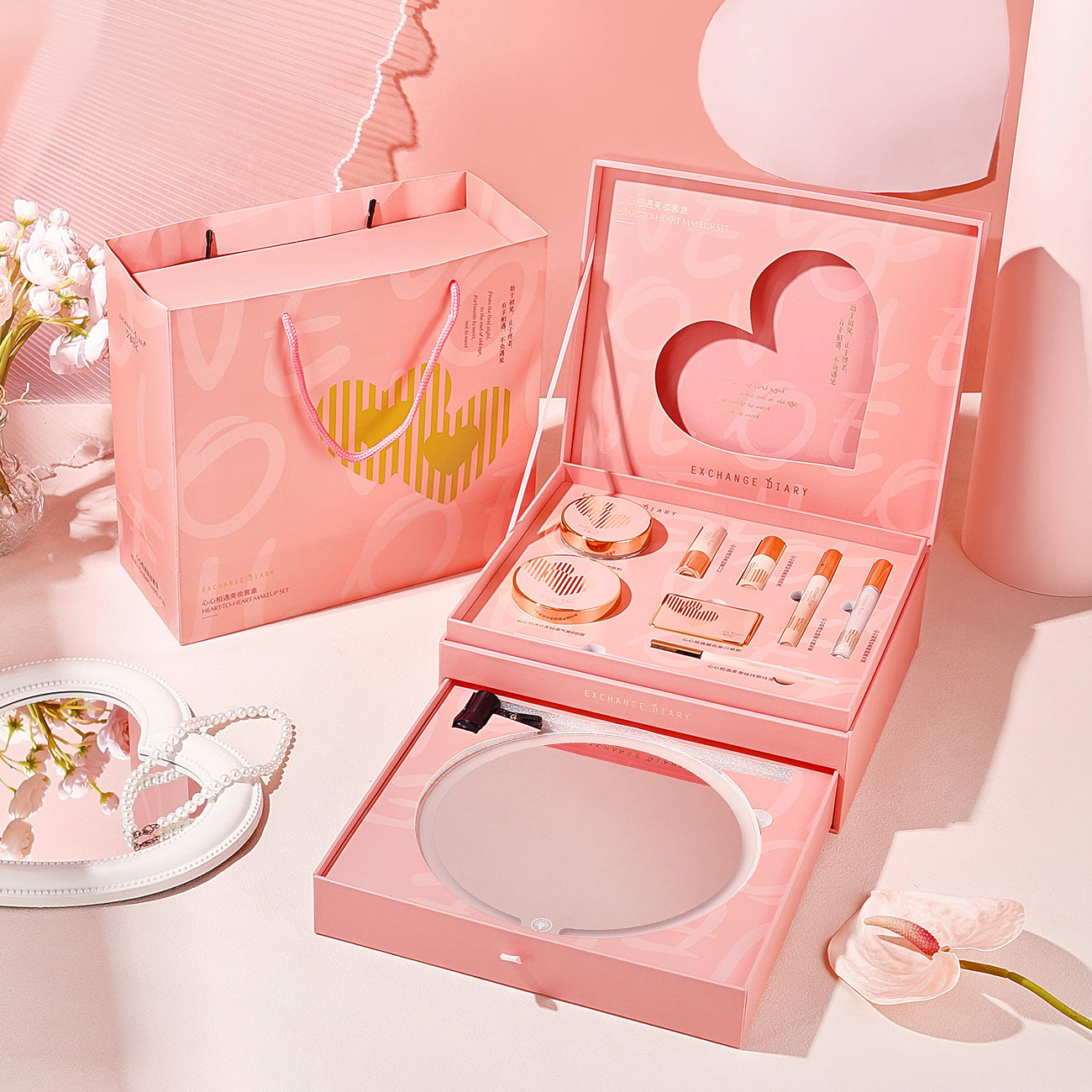 Pink makeup gift box with mirror on ivory marble vanity